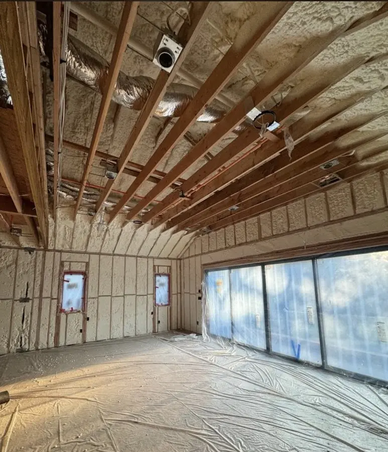 Interior walls and ceiling insulated with spray foam during new construction in Shelby